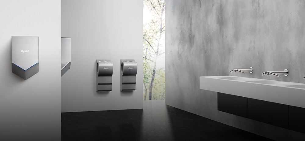 Dyson Airblade hand dryers in a washroom