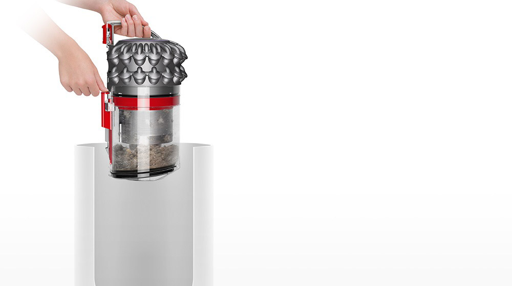 The new bin emptying mechanism, shown driving trapped dust straight into a bin.